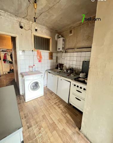 4 սենյականոց բնակարան Դրոյի փողոցում, 125 ք.մ., նախավերջին հարկ, քարե շենք