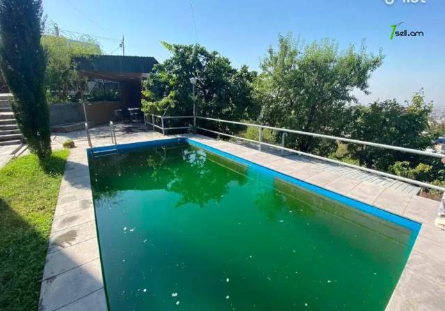 Երեք հարկանի քարե տուն Սերո Խանզադյան փողոցում Նորք Մարաշում, 370 ք.մ., 3+ սանհանգույց, մեծ հողամաս